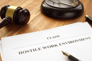 Gavel and legal paperwork for a workplace harassment and hostile work environment claim